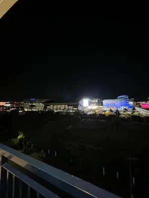 a view of a city at night with lights at Sea Residences Fireworks View - Reynil in Manila