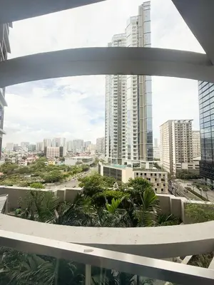 a view of the city from a building at City View Stay in Uptown BGC in Manila