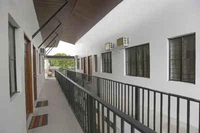 an empty hallway of a building with a balcony at OYO 736 Jade Apartelle in Cabuyao