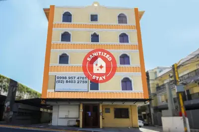 a building with a sign on the side of it at City Stay Inns Slex Makati in Manila