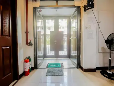 an entrance to a building with a glass door at City Stay Inns Slex Makati in Manila