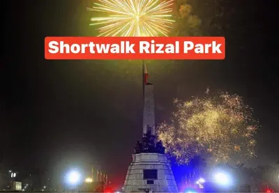 a sign that reads shaughkiss ritz missile park at night at Birch Tower A8 Front of Robinson Mla BayFree Pool in Manila