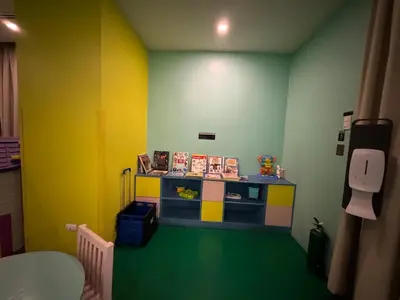 a room with a lego room with yellow and green walls at Netflix and WiFi Staycation Viceroy Walk to Venice Grand Canal in Manila