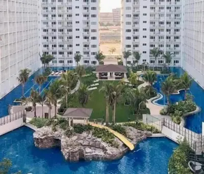 a view of a resort with a water park at Staycation near in Mall of Asia located in Shore1 and 2 Residences in Manila