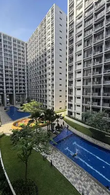 an overhead view of a large apartment building with a swimming pool at Staycation near in Mall of Asia located in Shore1 and 2 Residences in Manila