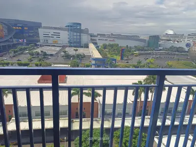 a view of a city from a balcony at Sea Residences Mall of Asia Viann in Manila