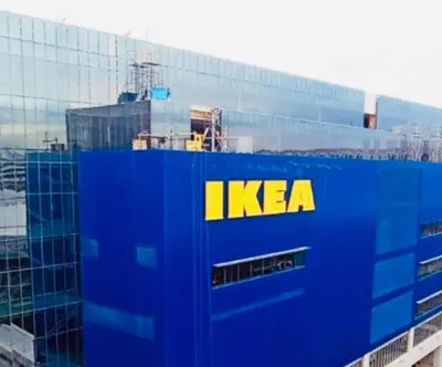 a kera building with a yellow sign on it at MOA staycation located in Shore1 and 2 Residences Pasay City in Manila