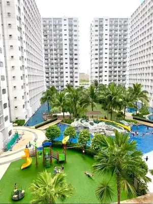 a view of a water park with a playground at Mall of Asia Condohotel located in Shore Residences Pasay in Manila