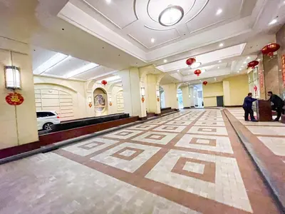 a hallway of a building with a tile floor at Spacious 3BR near US Embassy, Manila Ocean Park in Manila