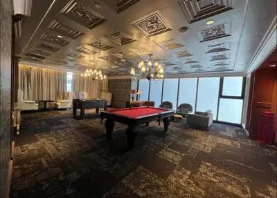 a large room with a pool table in it at Furnished Studio in Knightsbridge Residences in Manila