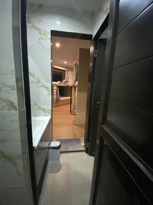 a door leading into a room with a hallway at BuenaSentro Hostel in Manila
