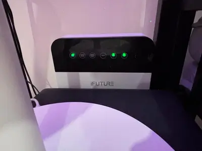 a purple and white oven with green lights on it at Urban Deca Tower Cubao - Affordable Condo Unit for Transient in Manila