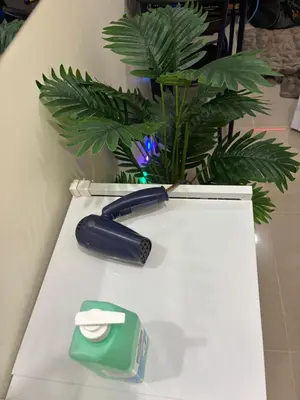 a table with a pen and a plant on it at Urban Deca Tower Cubao - Affordable Condo Unit for Transient in Manila