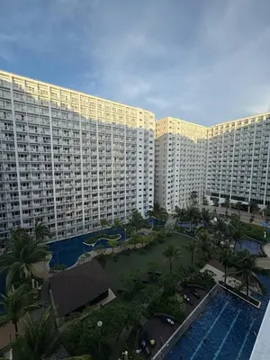 an aerial view of a large apartment building with a swimming pool at Azul Paradise in Manila