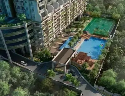 an overhead view of a large apartment building with a pool at Family Rooms with View in Manila