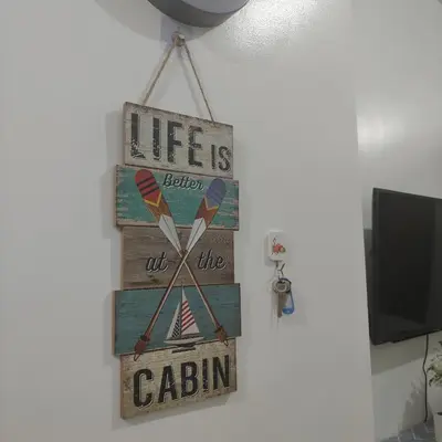 a sign that says life is better out the cabin at Condotel or apartment SM JAZZ RESIDENCES in Manila