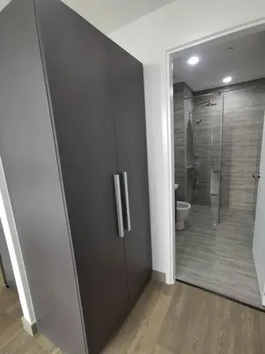 a bathroom with a walk in shower and a toilet at Luxury Condo at Century Spire in Central Makati in Manila