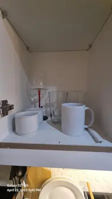 two cups sitting on top of a counter at Cozy new studio walk to Mall of Asia with balcony in Sampong