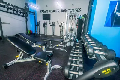 a gym with a row of treadmills and machines at AIR Residence Wondeful Condo Ayala Ave 1703 Central Makati Swim Gym in Manila