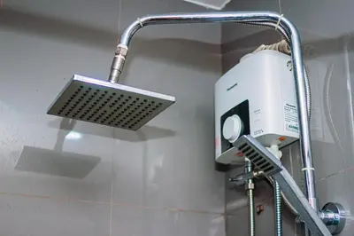 a shower head in a bathroom next to a shower at AIR Residence Wondeful Condo Ayala Ave 1703 Central Makati Swim Gym in Manila