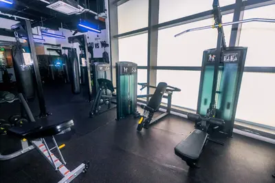 a gym with several tread machines in a room at AIR Residence Wondeful Condo Ayala Ave 1703 Central Makati Swim Gym in Manila