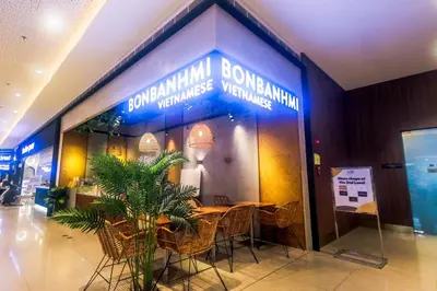 a restaurant with a table and chairs in a building at AIR Residence Wondeful Condo Ayala Ave 1703 Central Makati Swim Gym in Manila