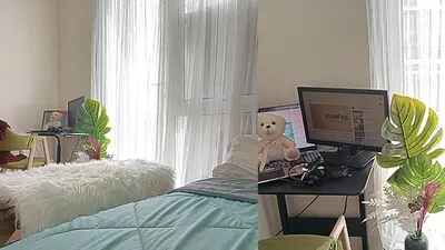 a bedroom with a desk with a computer on it at Condo Free Pool Fast Wi-fi near BGC, C5 in Manila