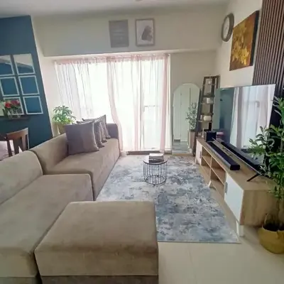 Family-Ready Skyline Retreat near BGC with Free Parking