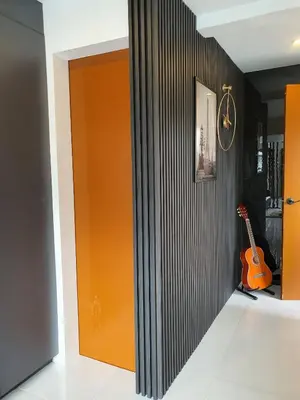 an orange door in a room with a guitar at Casa Prinza Luxury Suite in Teresa
