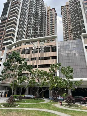 a large building with trees in front of tall buildings at Bayview near CCP, PICC, Airport, MOA, Okada at Radiance in Manila