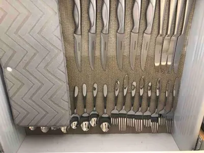a drawer filled with lots of different types of knives at BGC Urban Studio Prime Spot, Walk to Everything in Manila