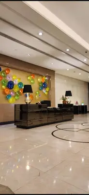a large lobby with balloons on the wall at The Venice Luxury Residences Condominium 28B Bellini, McKinley Hill, Taguig City, Philippines in Manila