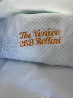 a pillow with the variance brilliant written on it at The Venice Luxury Residences Condominium 28B Bellini, McKinley Hill, Taguig City, Philippines in Manila