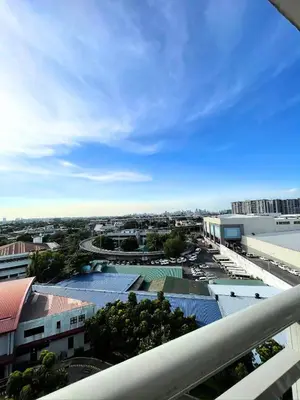 a view of a city from a balcony of a building at SM Bicutan Condotels by Sibs in Manila