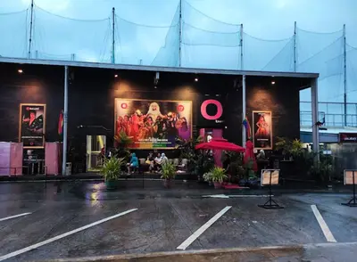 a building with a large poster on the front of it at The Cozy Palette Manila in Manila