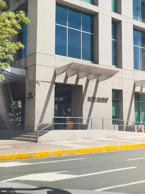 a building on a street in front of a building at The Crash Pad Soho Central in Manila
