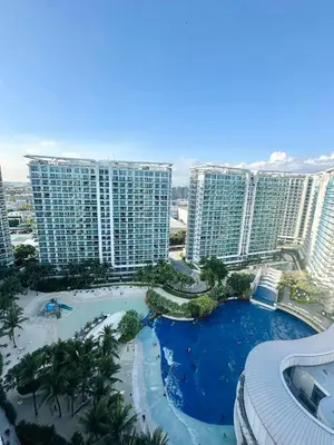 a view of a resort with tall buildings at SM Bicutan Azure Flat in Manila
