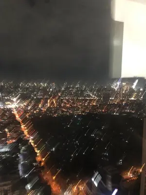 an aerial view of a city at night at Corner 1Bedroom with Unparalleled Views #5235 in Manila