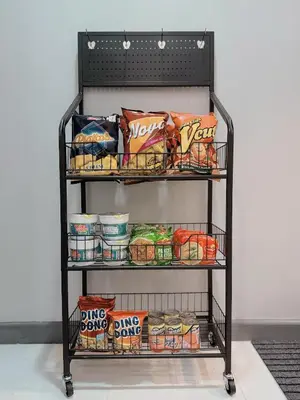 a shelf filled with food and other snacks at Arcadia Suites Manila at Acqua in Manila
