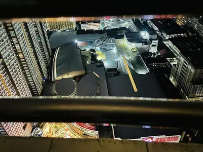a view of a city from the top of a building at Birch Tower a9 front of Robinson PlaceRizal park in Manila