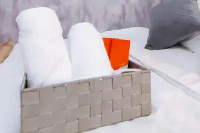 a toy brick wall in the snow on a bed at 1BR Condotel with Balcony at FAME Residences #FM02-1 in Manila