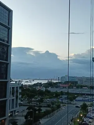a view of a city from a building at Shore moa view in Manila