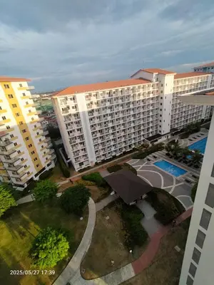 an aerial view of a large apartment building at 1123 Field Res Condo by Bambie free drinking water in Manila