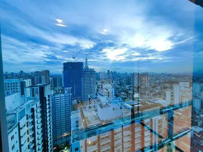 a view of a city from the top of a building at 1BR Condotel with Balcony at FAME Residences #FM03-1 in Manila