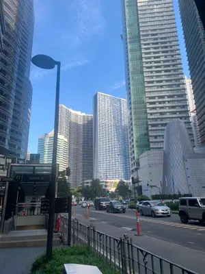 a city street with a street light and buildings at Makati City Ayala Ave Extension Condo with Fast Internet in Manila