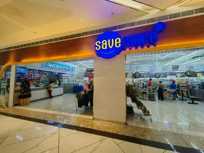 a save money store in a shopping mall at 1BR Condotel with Balcony at FAME Residences #FM11-1 in Manila