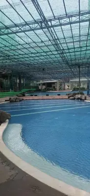 a large pool of water in a building at House of Lilith at Kasara in Manila