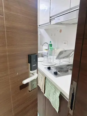 a kitchen with a sink and aaucet at SMDC AIR Residences in Manila