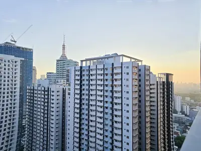 a view of a large city with tall buildings at 1BR Condotel with Balcony at FAME Residences #FM30-1 in Manila