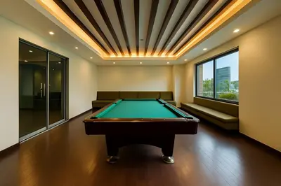 a pool table in a room with a ceiling at \u5eb7\u5bbf \u89c0\u703e\u9f4b Guan Lanzhai Studio in Sampong